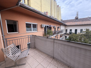 Bright Top-Floor Studio with Large Balcony