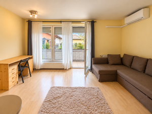 Bright Top-Floor Studio with Large Balcony