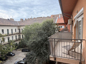 Bright Top-Floor Studio with Large Balcony