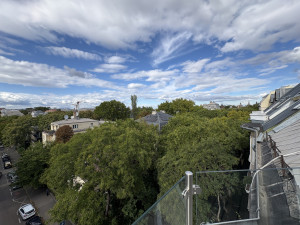 Elegant 3-Bedroom Duplex with Balcony & City Views.