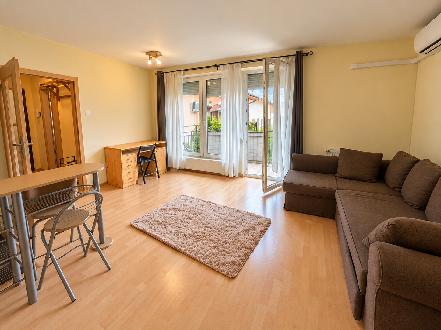 Bright Top-Floor Studio with Large Balcony